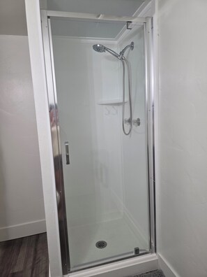 Shower, towels, soap, toilet paper