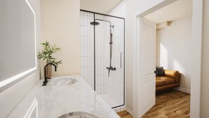 Shower, hair dryer, towels, soap