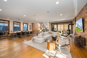 Smart TV, fireplace, books, printers