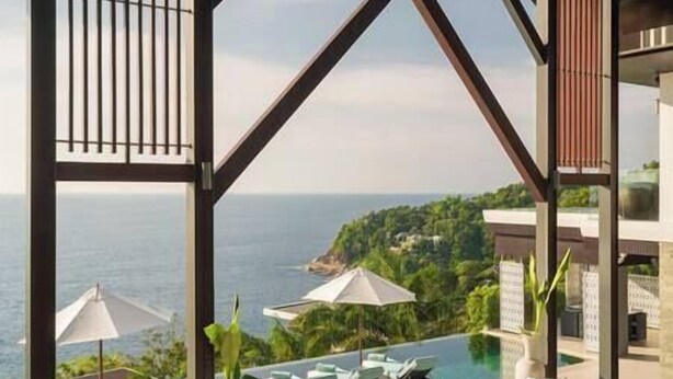 A pool area with lounge chairs and umbrellas, overlooking a coastal landscape. - Villa Samira | Kamala Sea View 6BR Villa | Pool, Chef, Spa (Kamala)