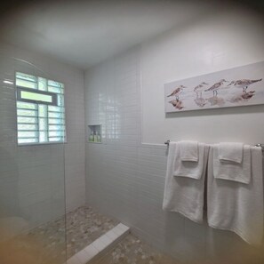 Shower, hair dryer, towels, soap