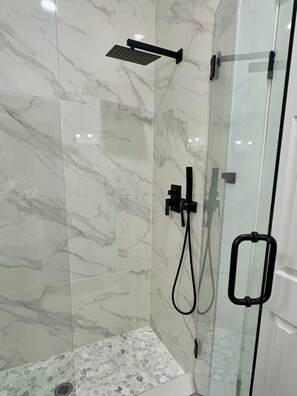 Shower, hair dryer, towels, soap