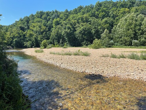 Enjoyable 2-bedroom house on 24 acres right on Black River.
