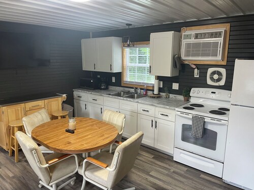 Enjoyable 2-bedroom house on 24 acres right on Black River.