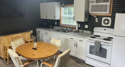 Enjoyable 2-bedroom house on 24 acres right on Black River.