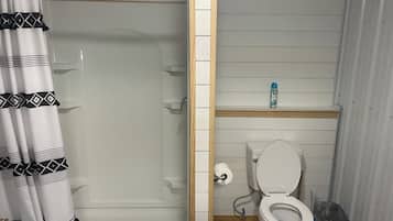 Shower, towels, soap, toilet paper