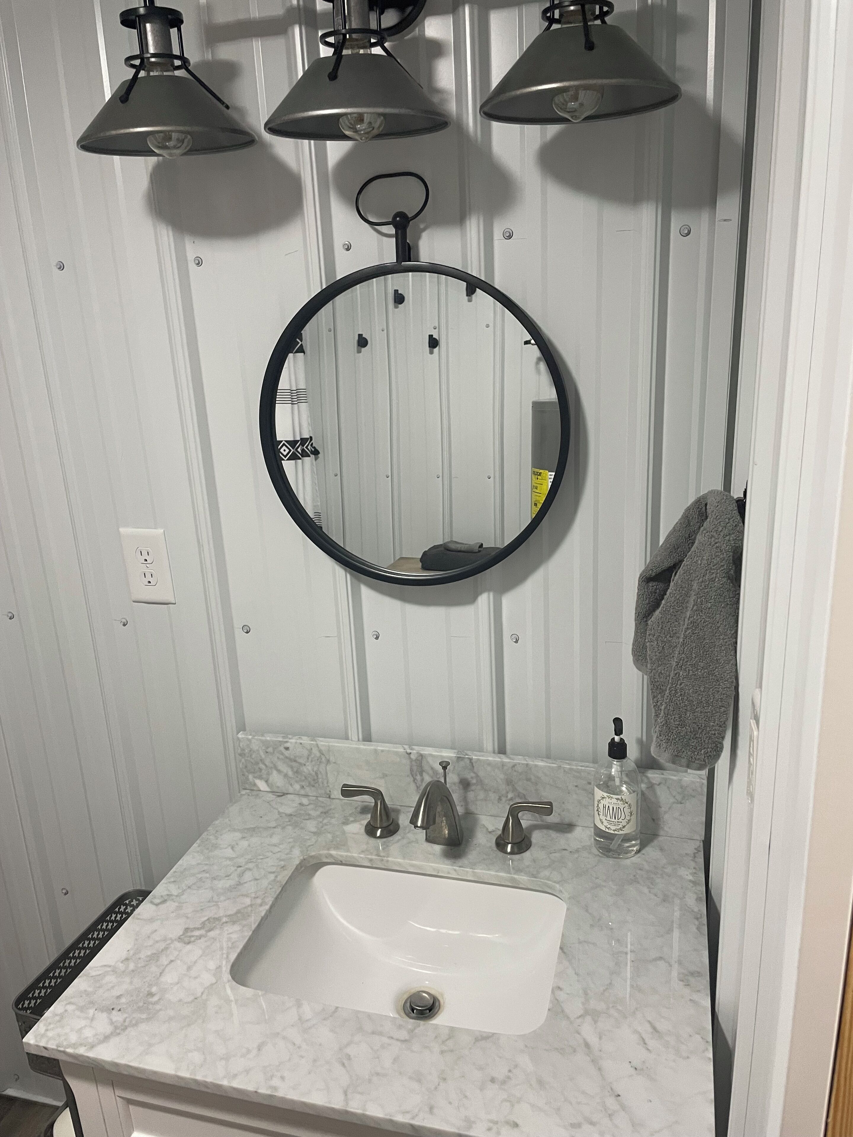 Shower, towels, soap, toilet paper