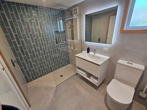 Hair dryer, towels, soap, toilet paper