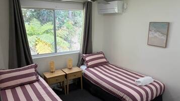 3 bedrooms, desk, iron/ironing board, travel cot
