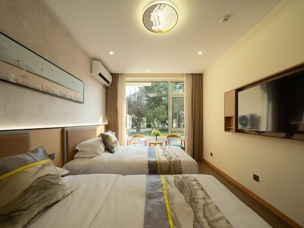 Habitación básica con 1 cama doble o 2 individuales | Cortinas opacas y sistema de insonorización