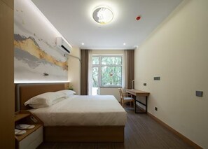 Suite estudio superior | Cortinas blackout, insonorización y tabla de planchar con plancha 