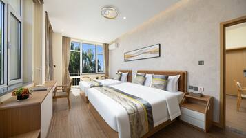 Family Studio, Roll-in Shower, Non Smoking | Down duvets, minibar, desk, laptop workspace
