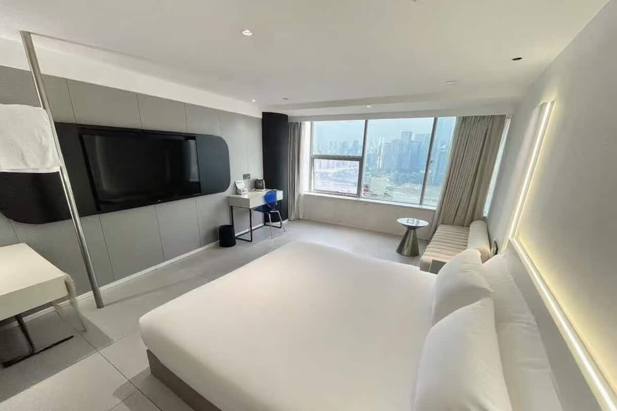Quarto solteiro superior, vista para o lago | Escrivaninha, Wi-Fi de cortesia, roupa de cama