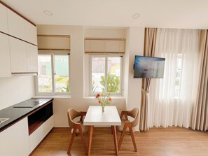 Superior Double Room, Non Smoking, Balcony | Private kitchen | Full-size fridge, microwave, oven, stovetop - Heyday apartment (Binh Thanh)