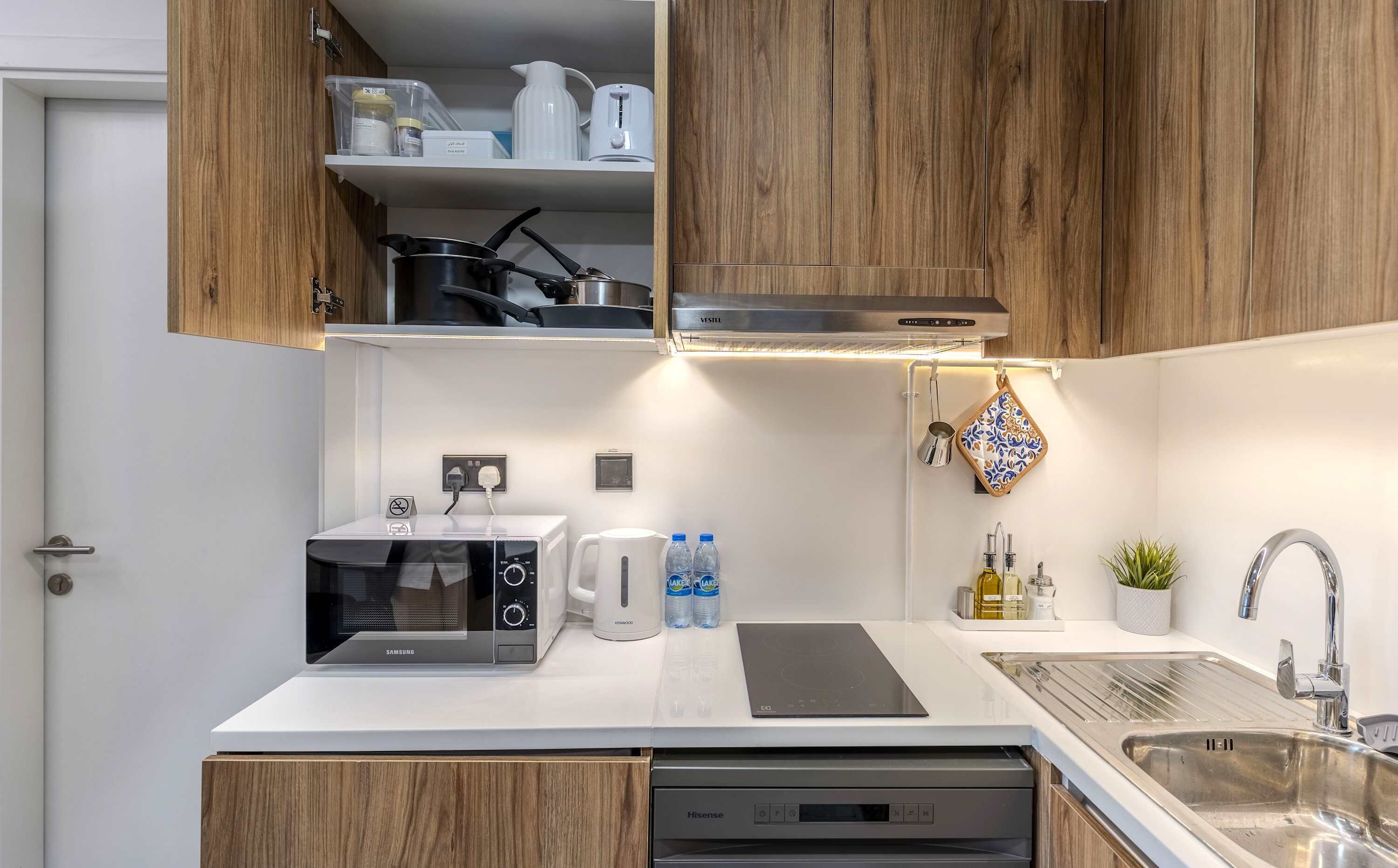 Fridge, microwave, stovetop, coffee/tea maker