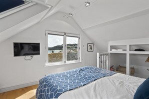 2 bedrooms, desk, iron/ironing board, travel crib