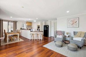 Spacious dining room with a functional kitchen with everything you could need for your home away from home.