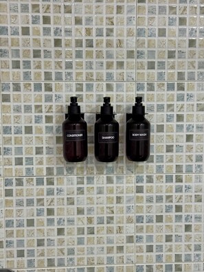 Hair dryer, towels, soap, toilet paper
