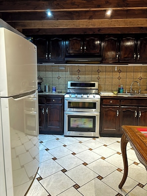 Family House, Patio, Beach View | Private kitchen