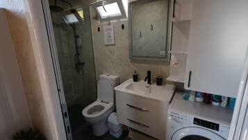 Hair dryer, towels, soap, toilet paper