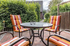 Outdoor dining - Apartment 50091 - Completely balanced: The first floor apartment is located in (Wittmund)