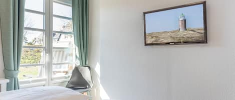 1 chambre, coffres-forts dans les chambres, fer et planche à repasser