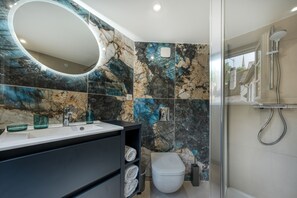 Hair dryer, towels, soap, toilet paper