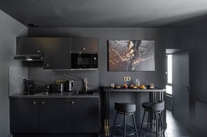 Fridge, microwave, cookware/dishes/utensils