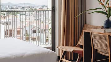 Premier Quadruple Room | Minibar, in-room safe, desk, laptop workspace