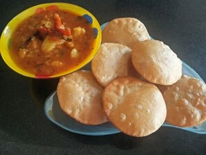Daily local cuisine breakfast (INR 400 per person)