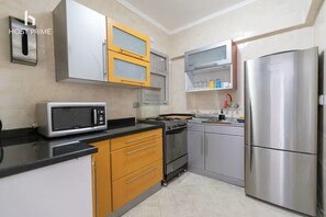 Appartement Confort, vue ville | Cuisine privée