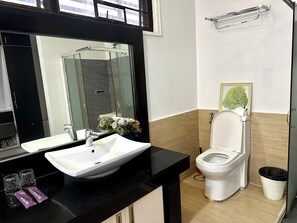 Shower, hair dryer, towels, soap