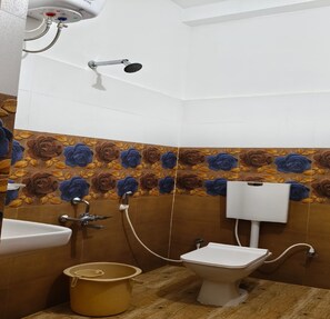 Shower, rainfall showerhead, towels, soap