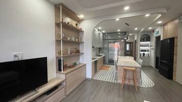 Deluxe Apartment, 2 Bedrooms, Beach View | Desk, laptop workspace, soundproofing, iron/ironing board
