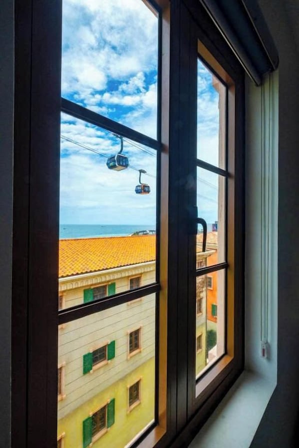 Habitación Deluxe doble, vistas a la playa | Servicio de comidas en la habitación