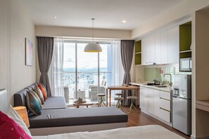 Junior Suite, City View | Desk, laptop workspace, blackout drapes, soundproofing
