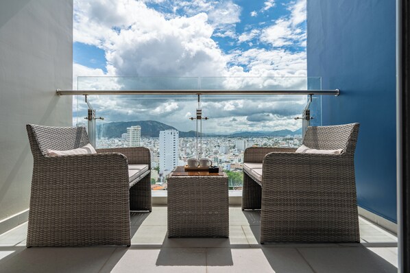 Junior Suite, City View | Balcony view