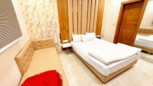 Premium bedding, desk, laptop workspace, soundproofing