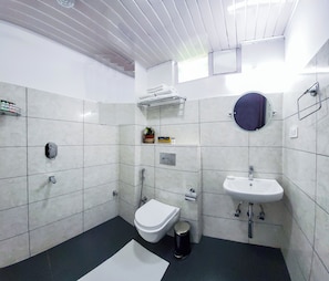 Shower, slippers, towels, soap