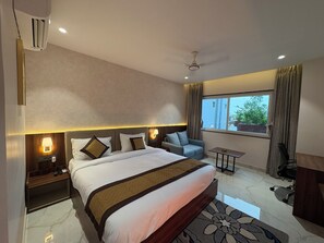 Superior Double Room, City View | Desk, laptop workspace, blackout drapes, iron/ironing board - Basera Hotel Samastipur (Samastipur)