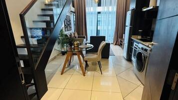 Luxury Apartment, 1 Bedroom, Non Smoking, Pool View | Individually decorated, individually furnished, desk, laptop workspace