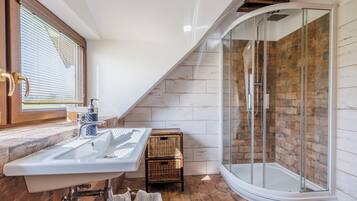 Shower, free toiletries, hair dryer, slippers