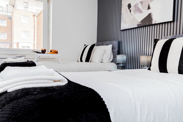 Wake up refreshed in a spacious bedroom designed for comfort, relaxation, and a home-like feel.