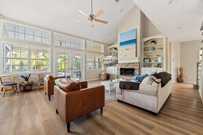 TV, fireplace, books, offices