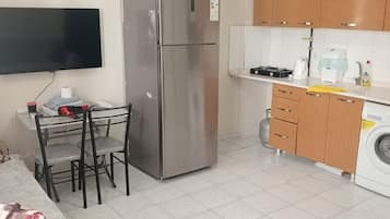 Bloc d'apartaments, balcó, vistes a la ciutat | Cuina privada