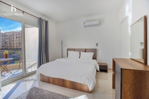Apartment, Garden View | In-room safe, blackout drapes, iron/ironing board, free WiFi