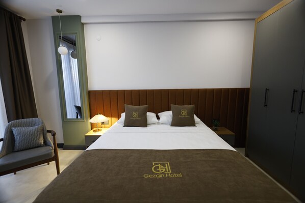 Deluxe Double Room, City View | In-room safe, desk, laptop workspace, blackout drapes