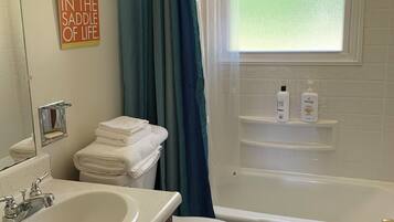 Hair dryer, towels, soap, shampoo