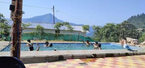 Outdoor pool, pool umbrellas, pool loungers