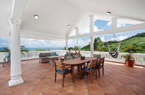 Outdoor dining - Casa Blue Laguna I |Tropical Scape with Ocean View at Steps of Bioluminescent Bay I Laguna Grande (Las Croabas)